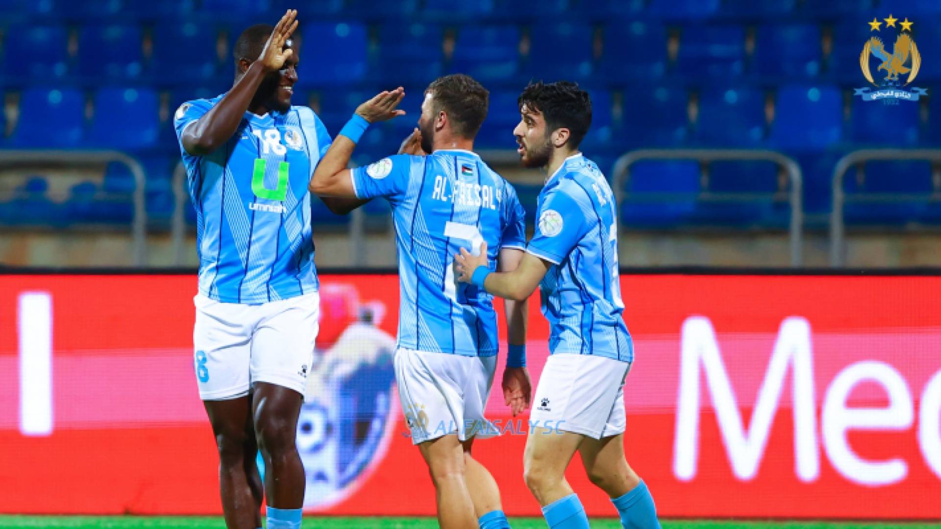 لاعبو الفيصلي يحتفلون بهدف سابق